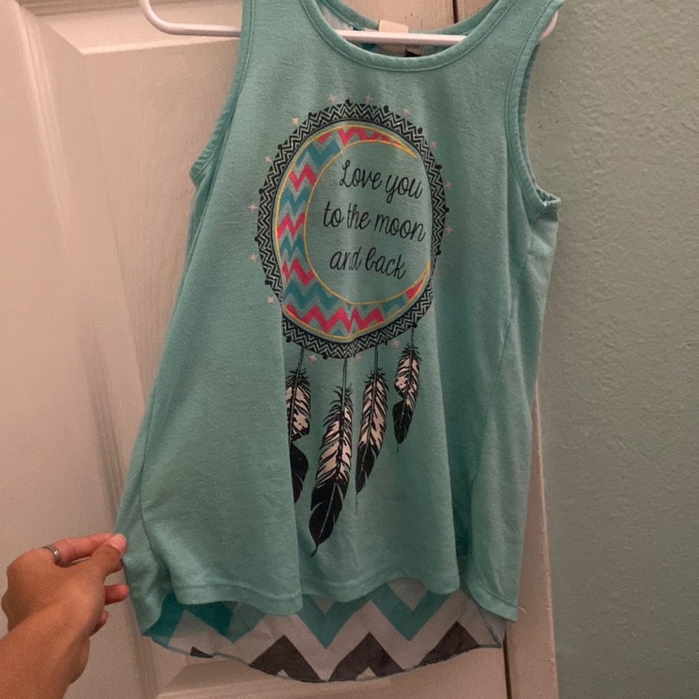 Kid’s turquoise tank top. Size M. USED